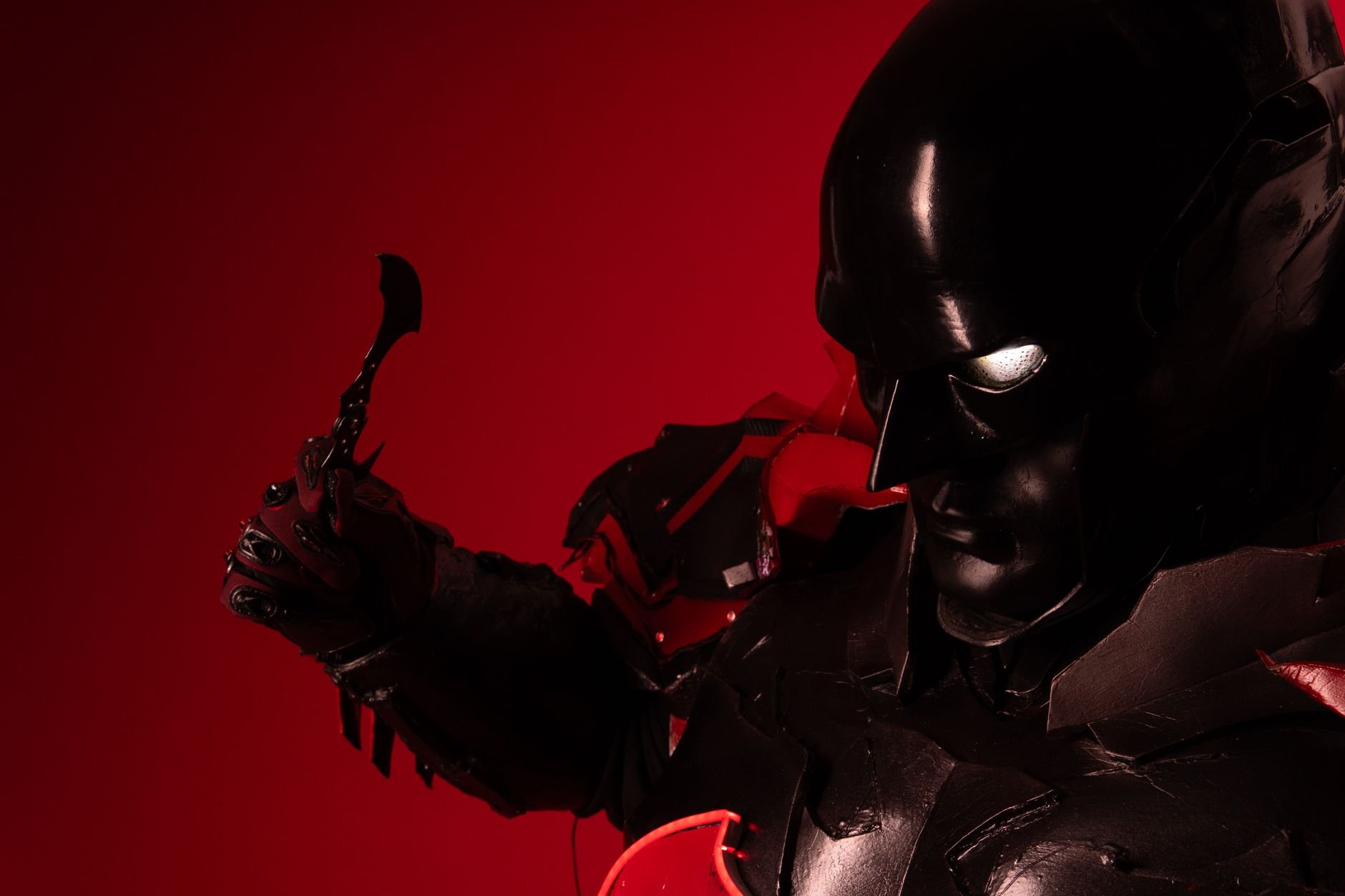 Dark superhero cosplay dramatic lighting
